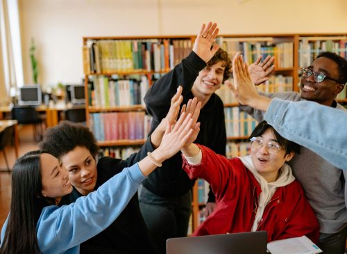 kids high-fiving